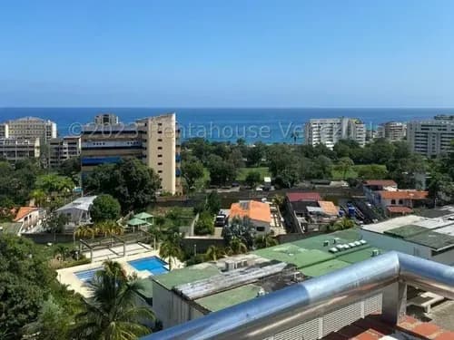 Apartamento En Venta, El Caribe-la Guaira. Vista Al Mar Y Al Campo De Golf, Piscina, Parrillera, Area De Juegos Infantiles, Cancha.11024.