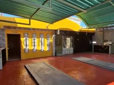 En Alquiler Local Comercial con fosas para cambio de aceite de vehículos
