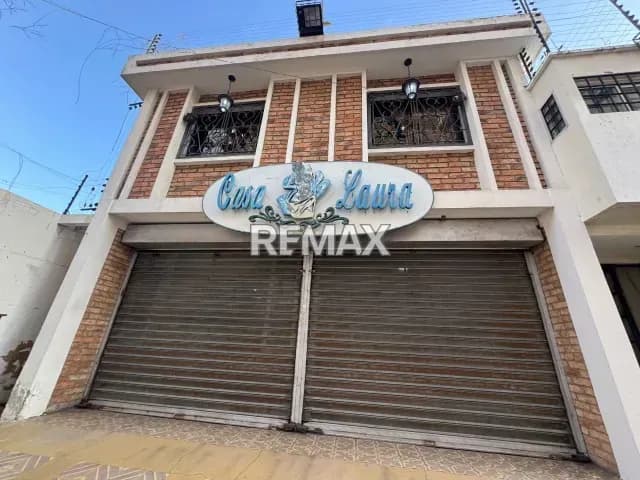 EDIFICIO COMERCIAL RESIDENCIAL RESIDENCIAS LAURA ANTIGUO SPA Y PELUQUERIA