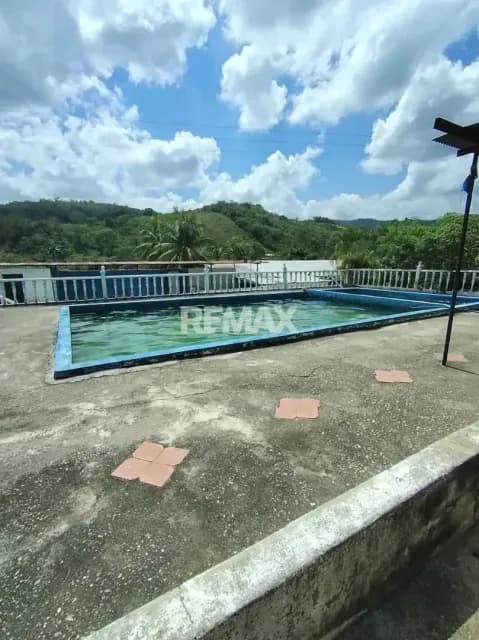 Establecimiento Comercial con una superficie de 3.767 mts2 con 240 mts2 de Construcción en el Cacao de Motatán