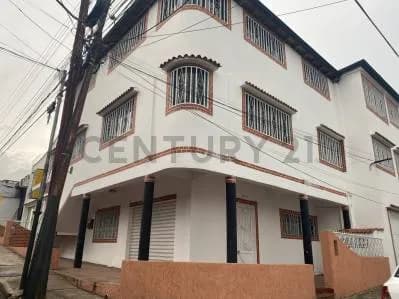 propiedad comercial en el corazón de barrio obrero