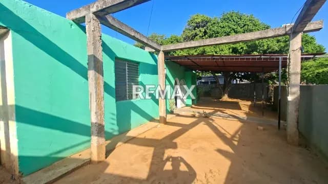 TERRENO Y CONSTRUCCION