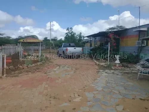Terreno En Venta Con Bienhechuria, Jardin Y Parrillera Via Jadacaquiva # 24-20469