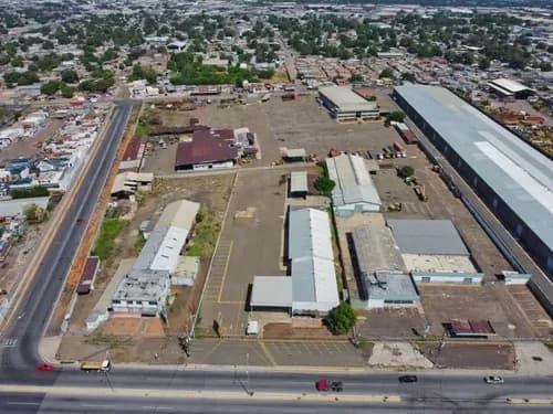Conjunto De Galpones Y Edifico De Oficina De 4 Hectarias En Venta Cb