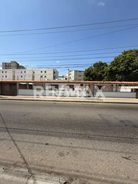 Casa comercial Av 10